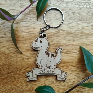 Personalised Dinosaur Keyring: Engraved Wooden Animal Tag, Back to School Gift