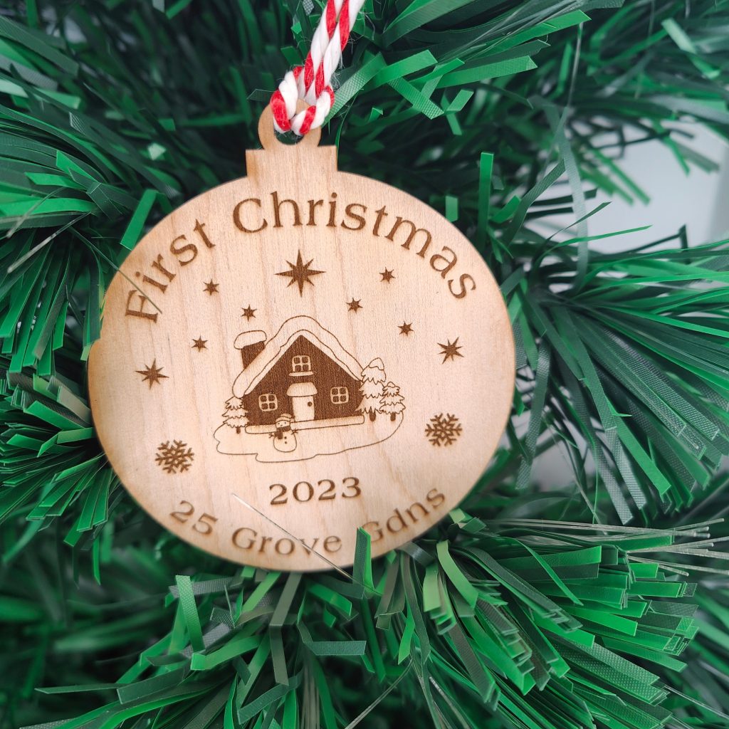 Personalised First Christmas New Home Ornament: Engraved Wood Bauble