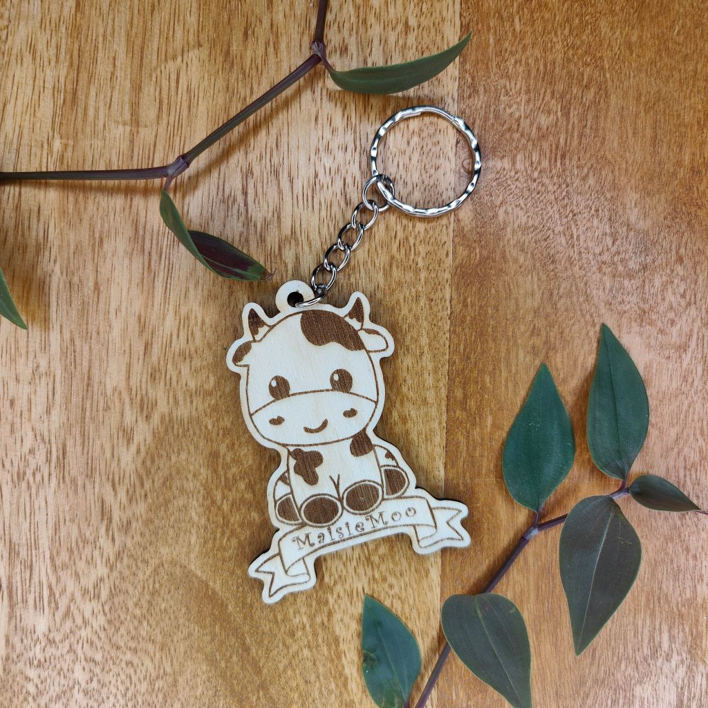 Personalised Wooden Cow Keyring: Engraved Book Bag Tag