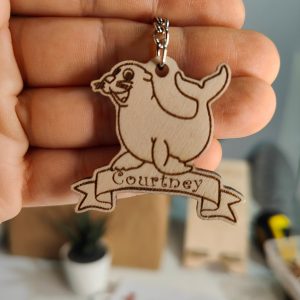 Personalised Seal Keyring: Laser Engraved Wooden Animal Bag Tag